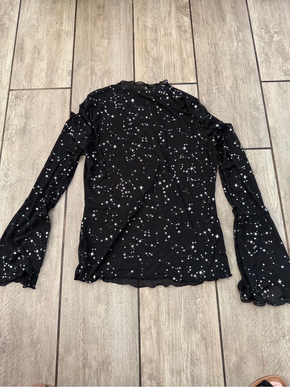 Women’s Black Star Print Long Sleeve Top